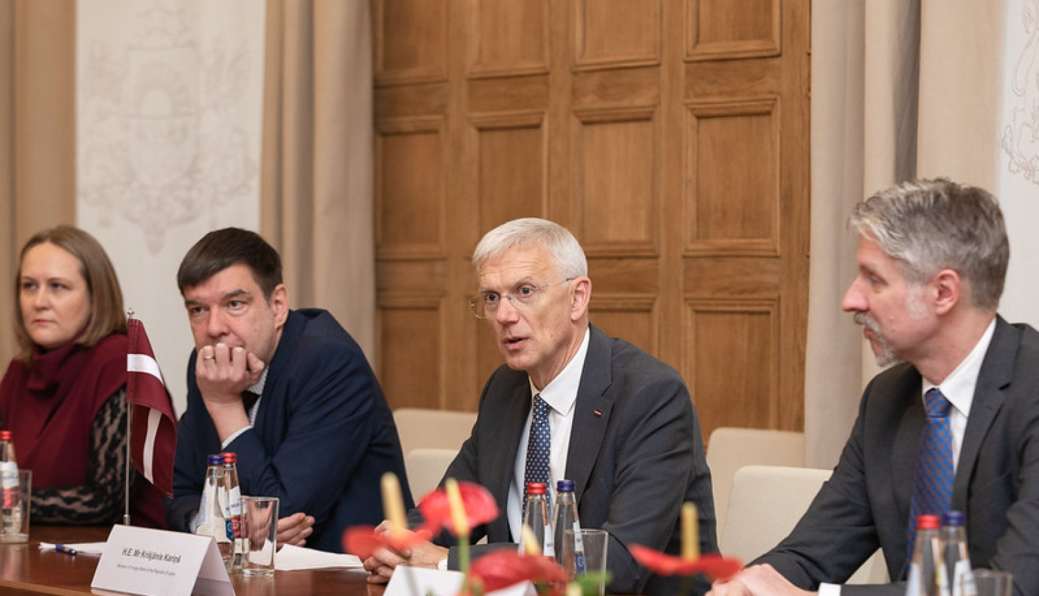 K.Kariņš un NOR