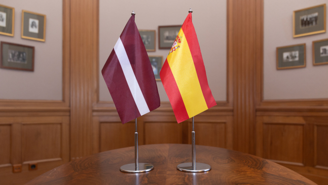 Latvian and Spanish flags