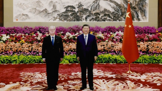 Kārlis Eihenbaums un Xi Jinping