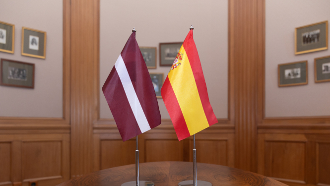 Latvian and Spanish flags