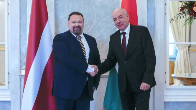 Jurijs Pogrebņaks un Tamás Sulyok