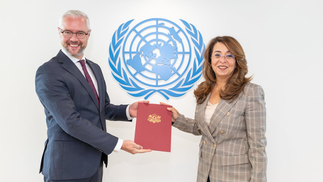 Raimonds Oškalns un Ghada Waly