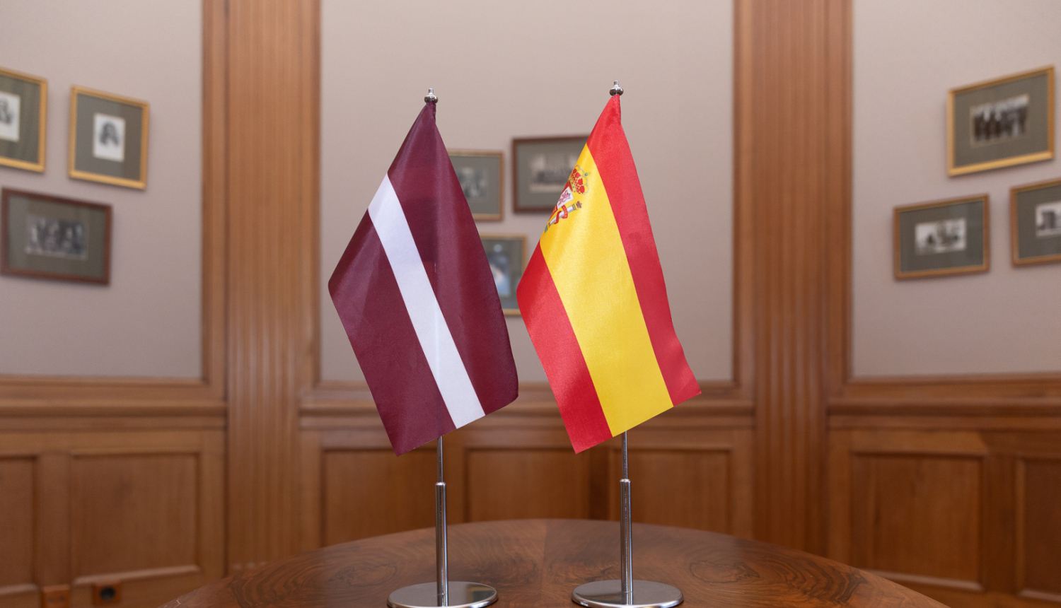 Latvian and Spanish flags
