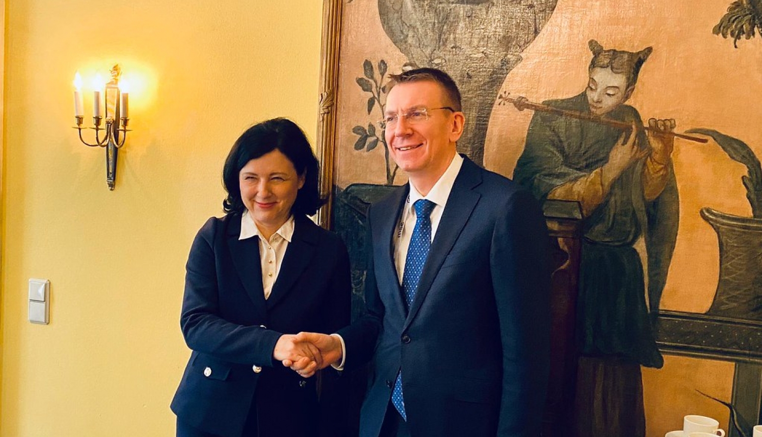 Latvian Foreign Minister Edgars Rinkēvičs and European Commission Vice  President Věra Jourova in Munich discuss strengthening the rule of law and  the fight against disinformation in Europe
