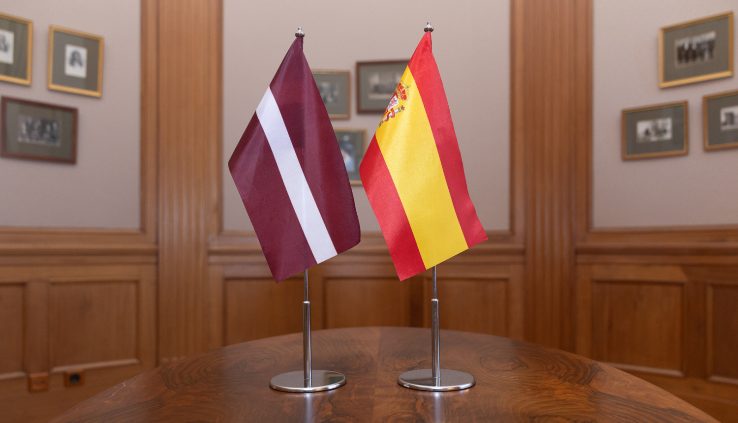 Latvian and Spanish flags